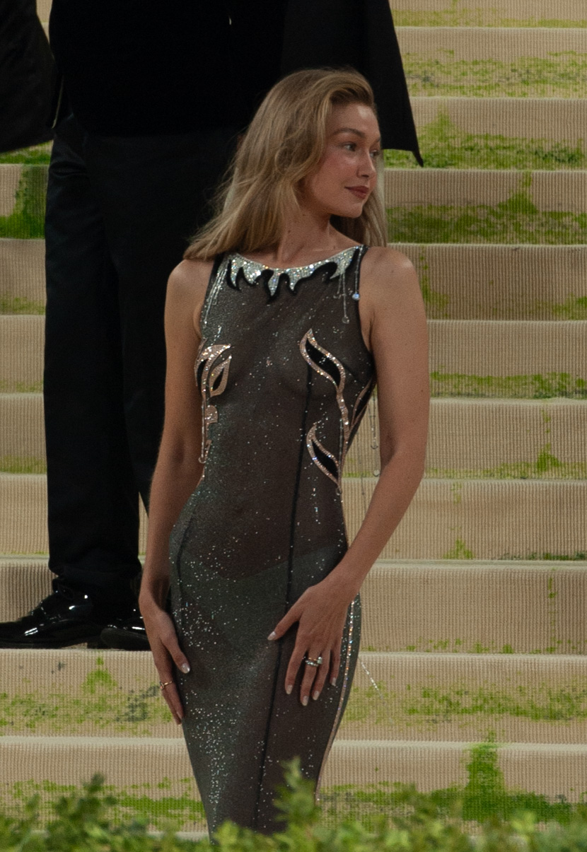 Gigi Hadid at the 2026 Met Gala in an embroidered sheer Miu Miu gown